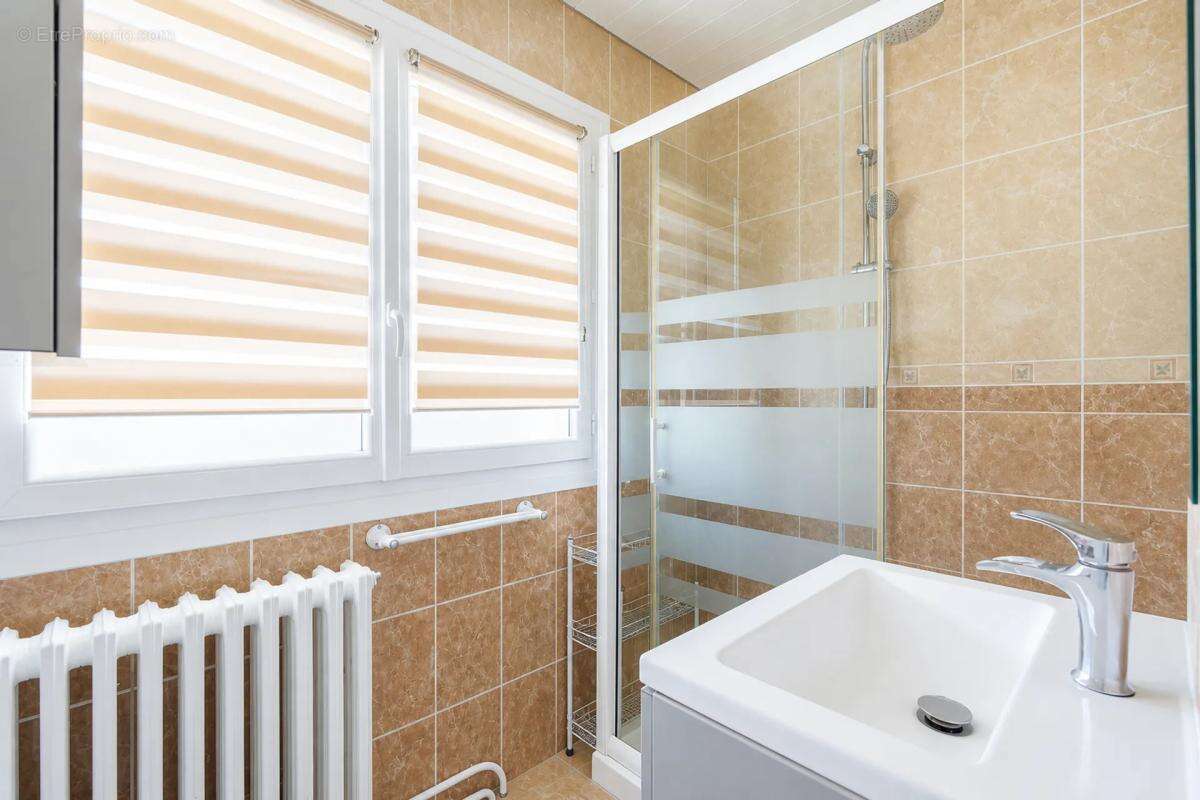 Maison de 5 pièces de 150 m² située à Sainte-Savine - photo 8