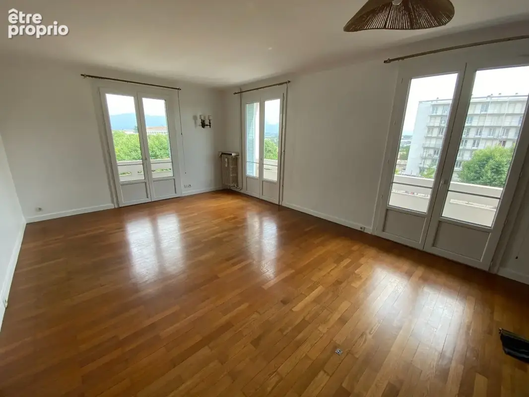 Salon - Salle à manger - Appartement à ROMANS-SUR-ISERE