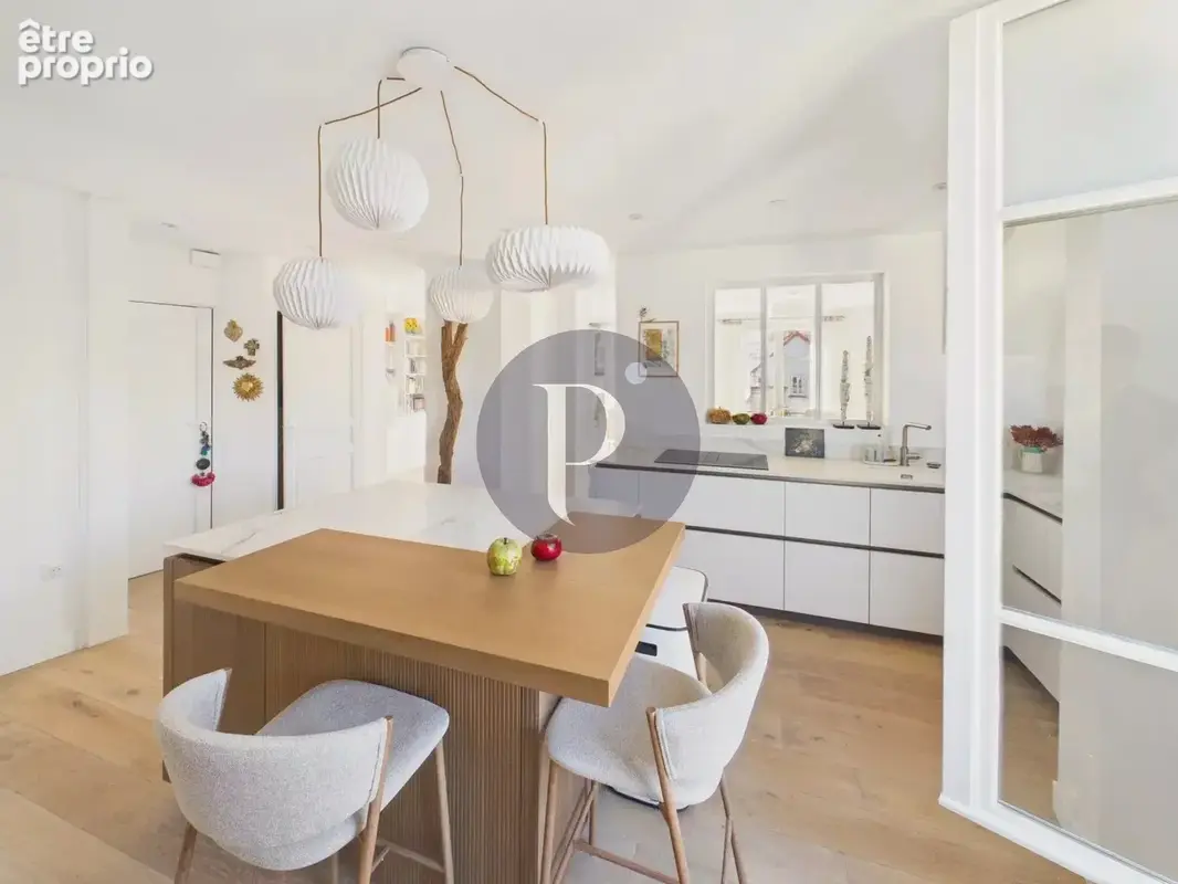 La surprise sous les toits : duplex style loft exceptionnel. - photo 10