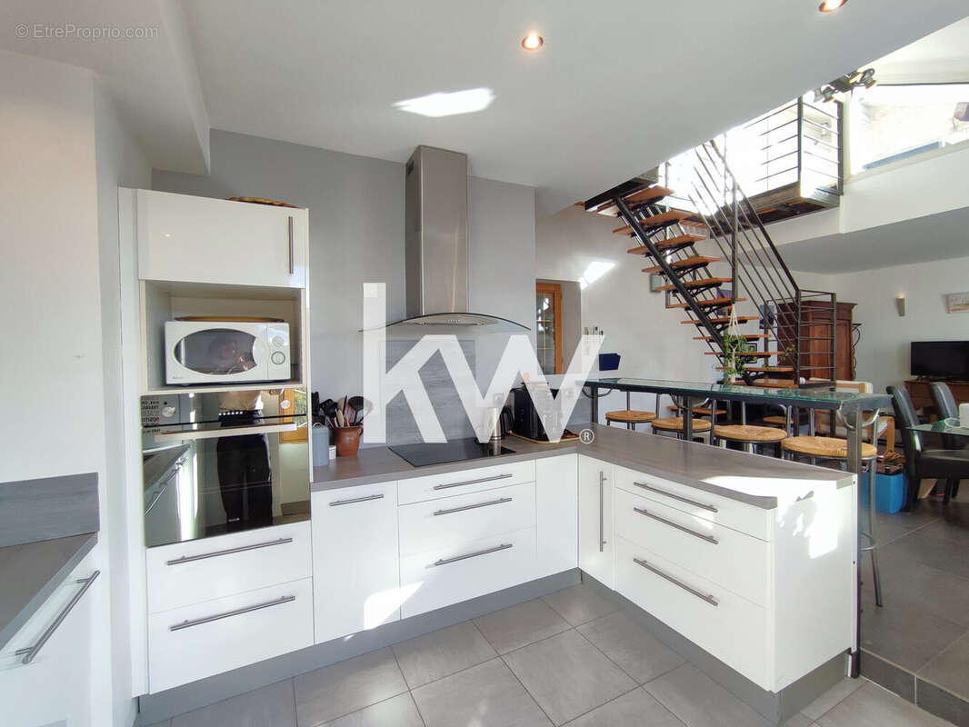 Appartement 91 m² à Roche-La-Moliere  - photo 4