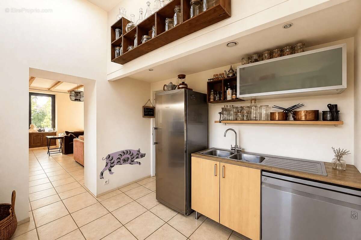 Maison familiale en pierres de caractère – 205 m² – 4 chambres – Jardin de 1 000 m² – Bréhan - photo 11