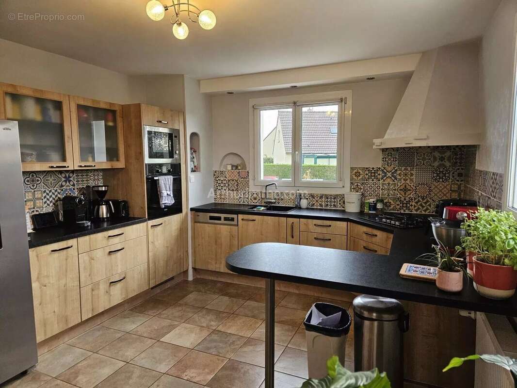 Maison à DEMOUVILLE