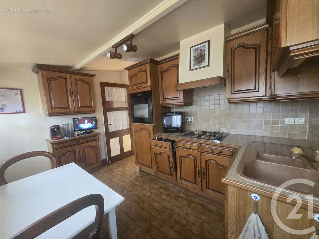 Maison 94 m² à La Neuve-Lyre  - photo 5