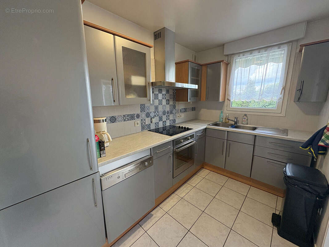 HAUBOURDIN - Appartement 3 pièces de 69 m² avec balcon plein sud, garage et parking - photo 3