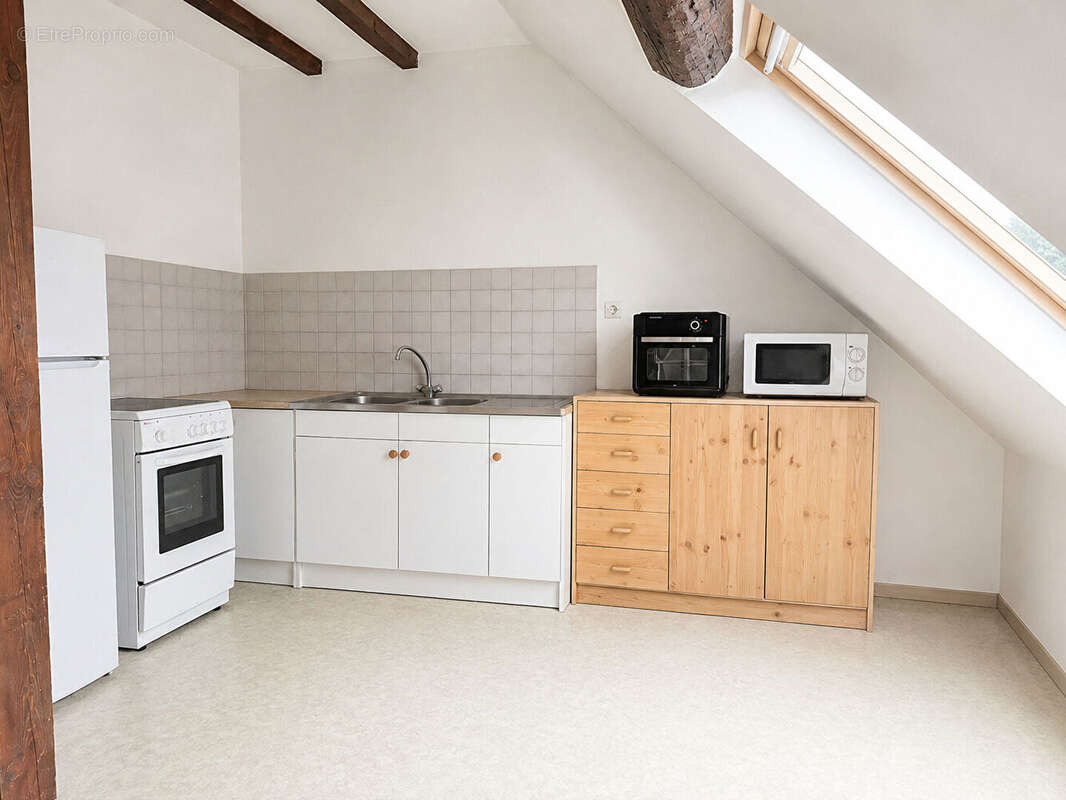 Appartement T4 en duplex à 2 pas du centre-ville - photo 2