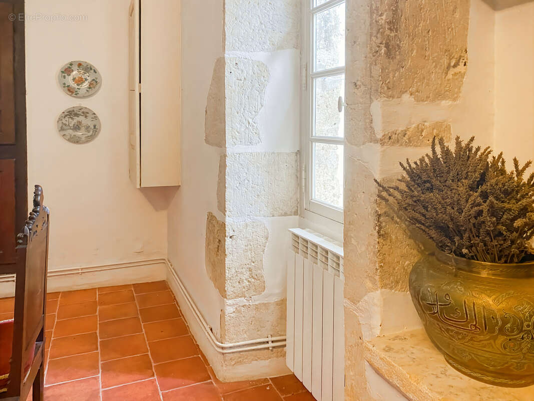 À Vendre – Maison de village en pierre (6 pièces) de 227 m² à Bazian (Gers) avec cour et jardinet - photo 6