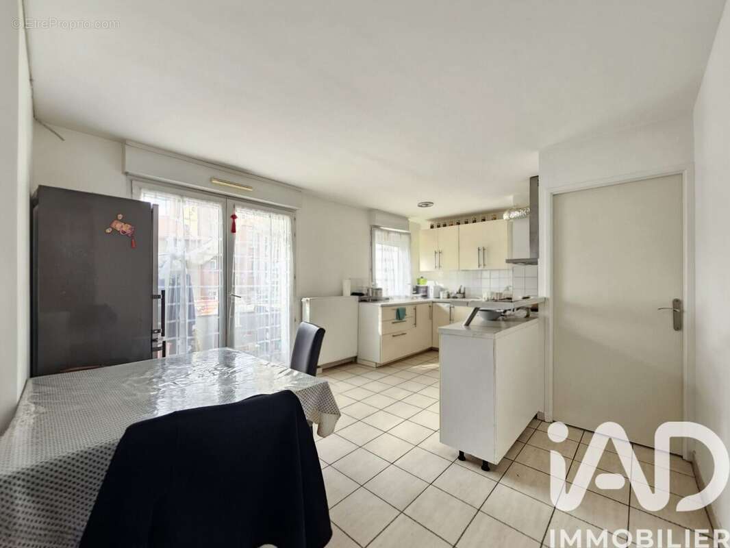 Photo 7 - Appartement à LA COURNEUVE