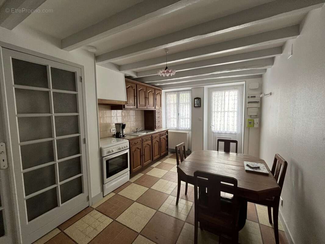 Une maison de village pratique - pour investir ou vivre - photo 4