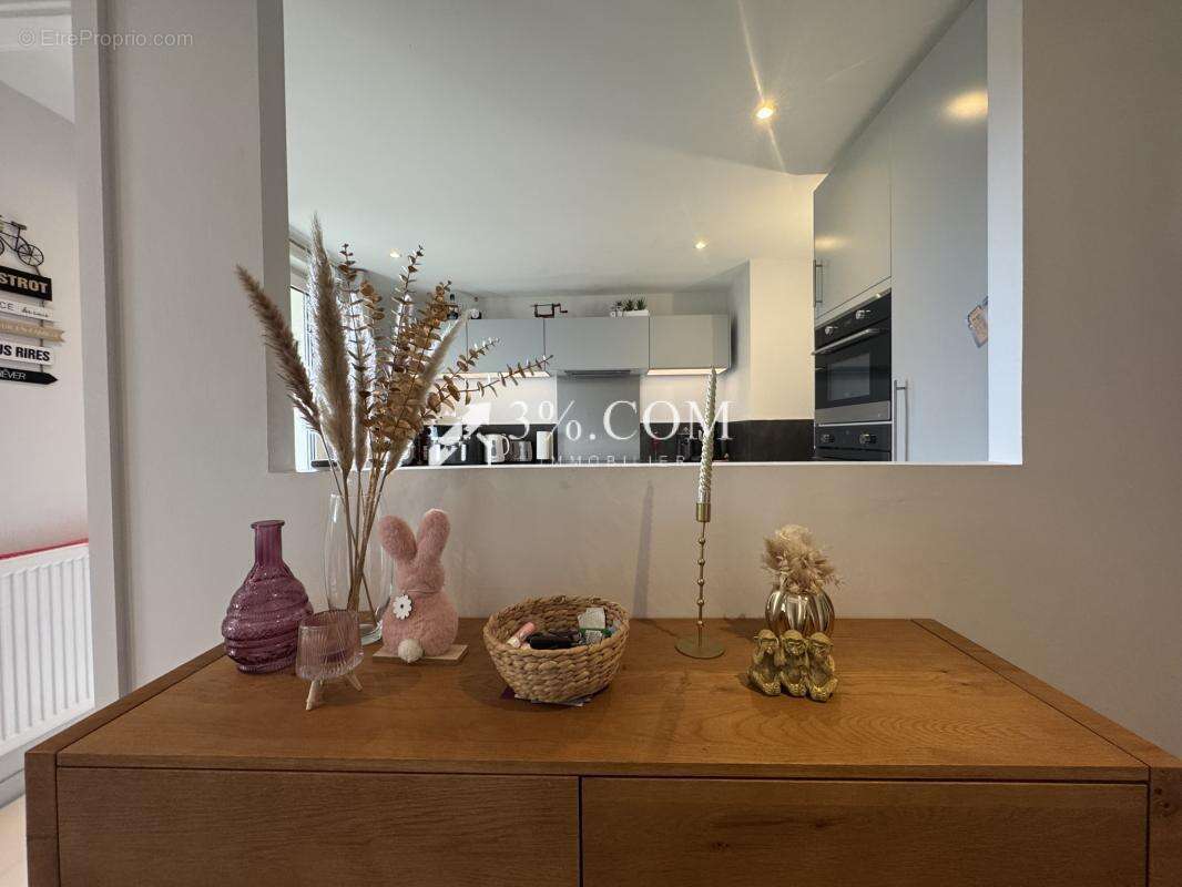 3%COM beau F3 avec terrasse et 2 places de parking- cave - photo 4