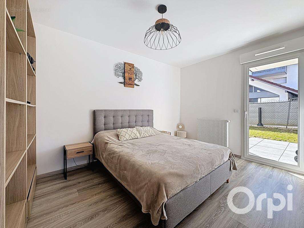 NANGY - Appartement rez-de-jardin - photo 6