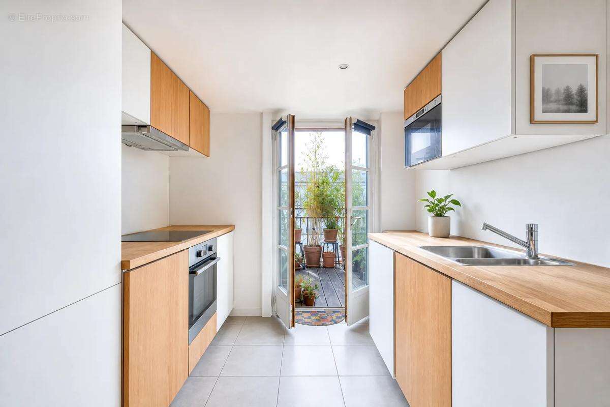Duplex lumineux avec terrasse Paris 11 - photo 6