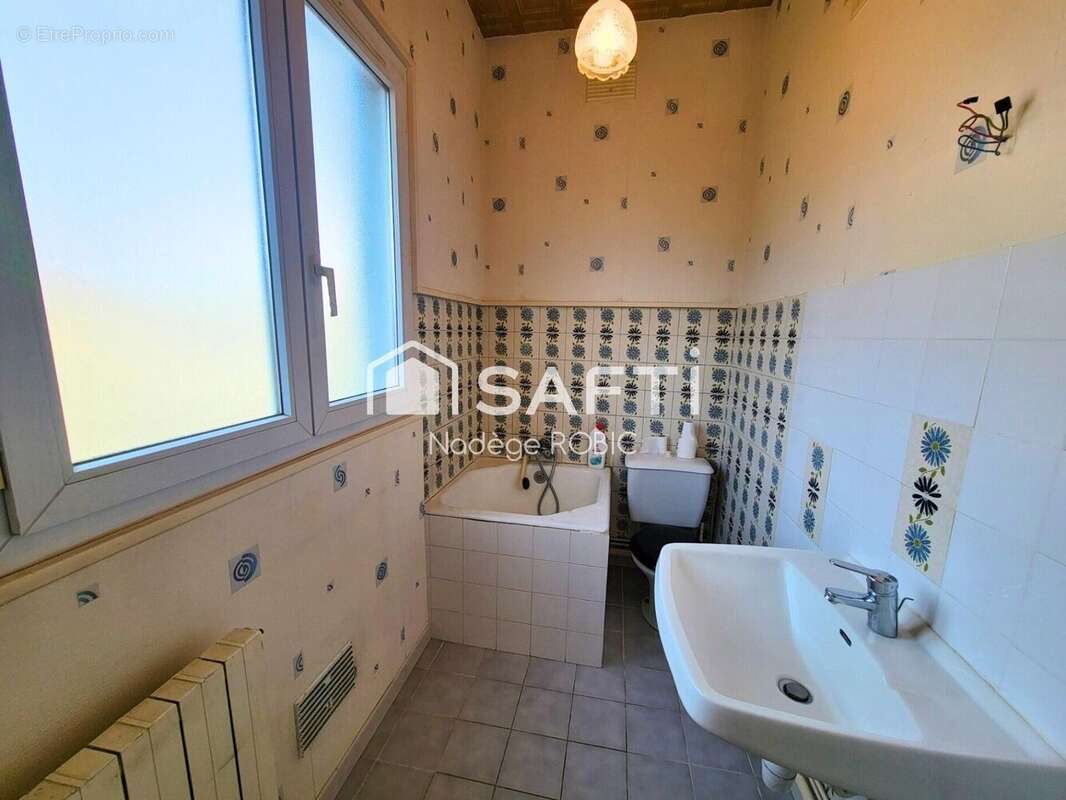 Photo 8 - Maison à SEICHES-SUR-LE-LOIR