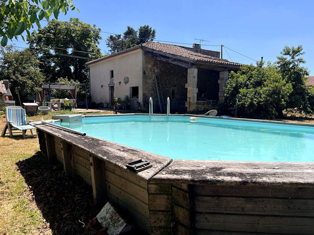Maison de caractère à rénover avec potentiel - photo 2