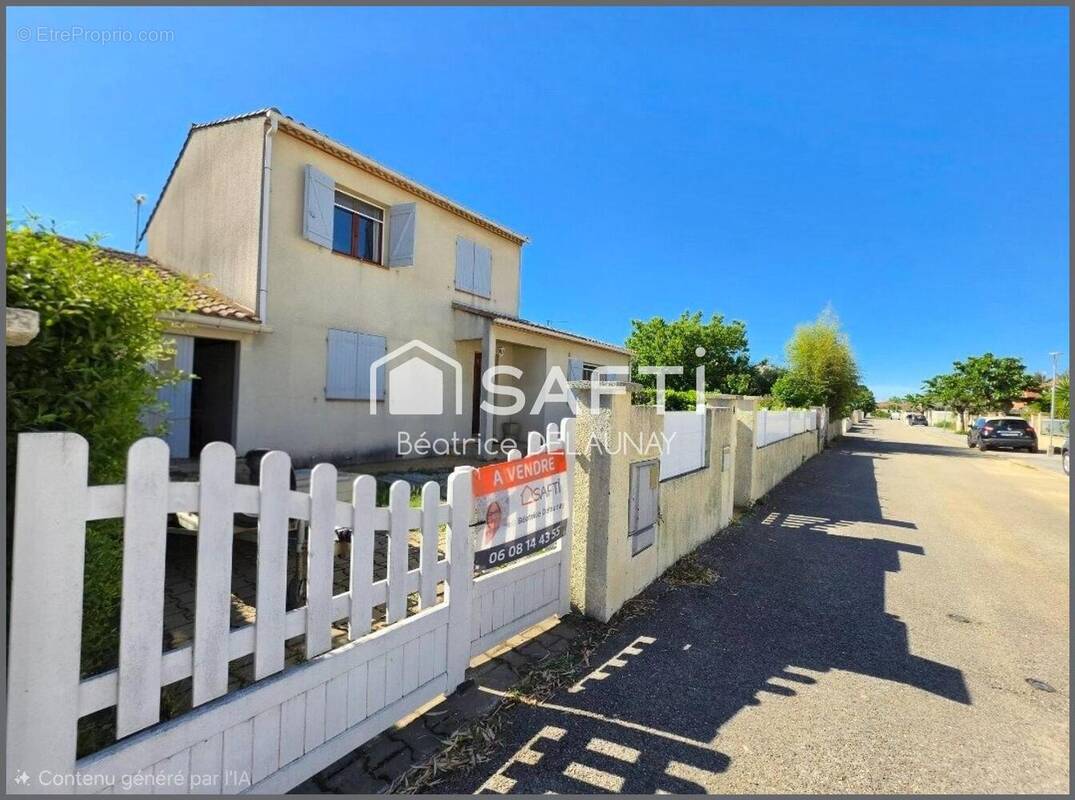 Photo 1 - Maison à SAINT-LAURENT-D'AIGOUZE