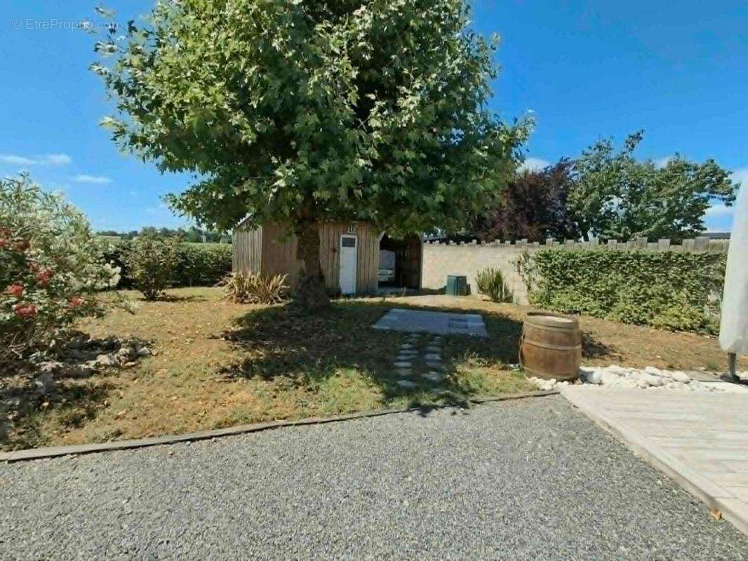 Maison de plain-pied récente 2020 avec jardin sans vis-à-vis, dépendance, carport et possibilité d'extension - photo 10