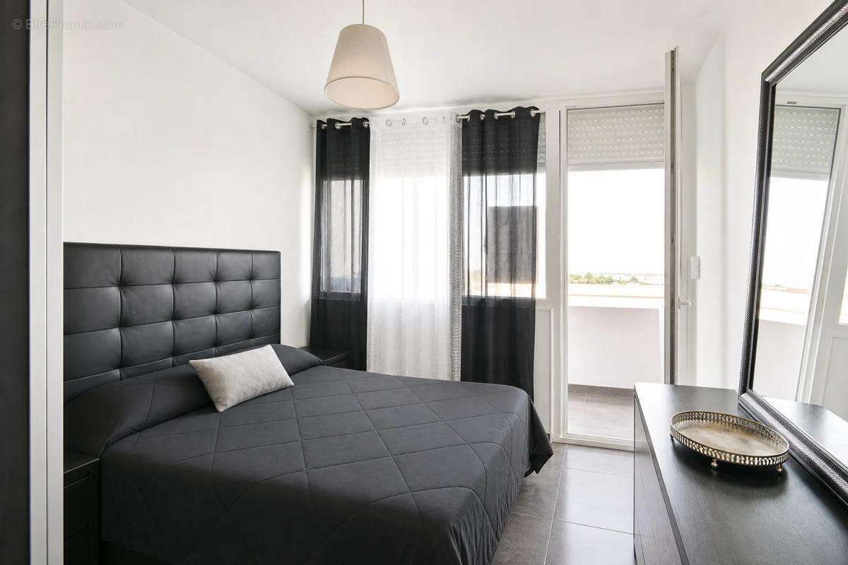 Appartement 4 pièces de 72 m² vendu loué - photo 5