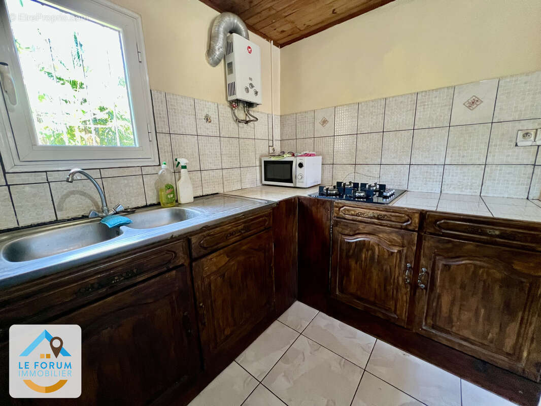Saint joseph 97480 - villa f3 habitable de suite -varangue + garage - terrain clos et piscinable - facile d'ac - photo 2
