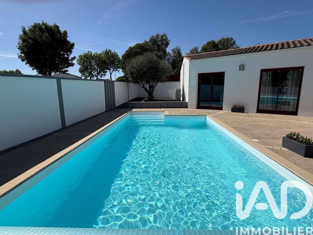 Maison 126 m² à Dompierre-Sur-Mer  - photo 6