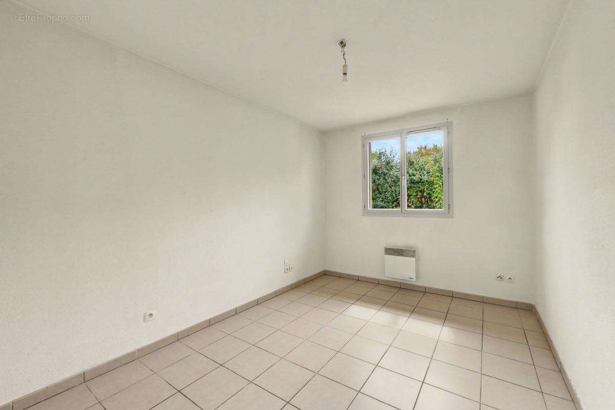 Maison 4 pièces 90 m² - Saint-Jory - Plain-pied avec jardin, garage et terrasse - photo 13