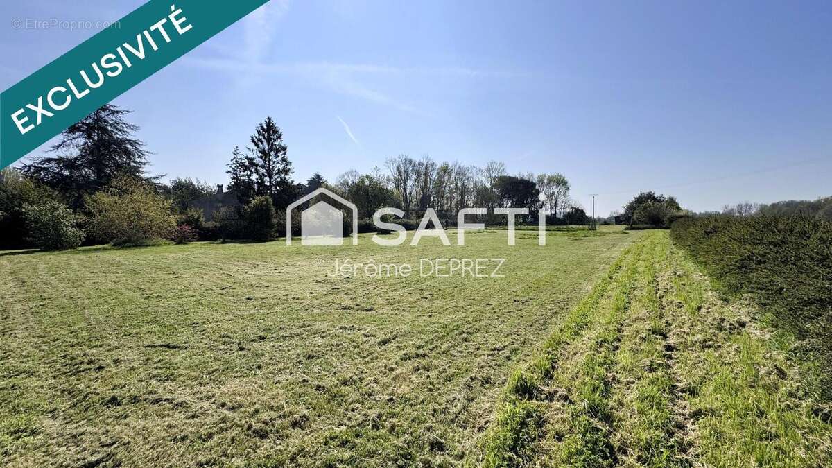 Photo 2 - Terrain à LES MAGNILS-REIGNIERS