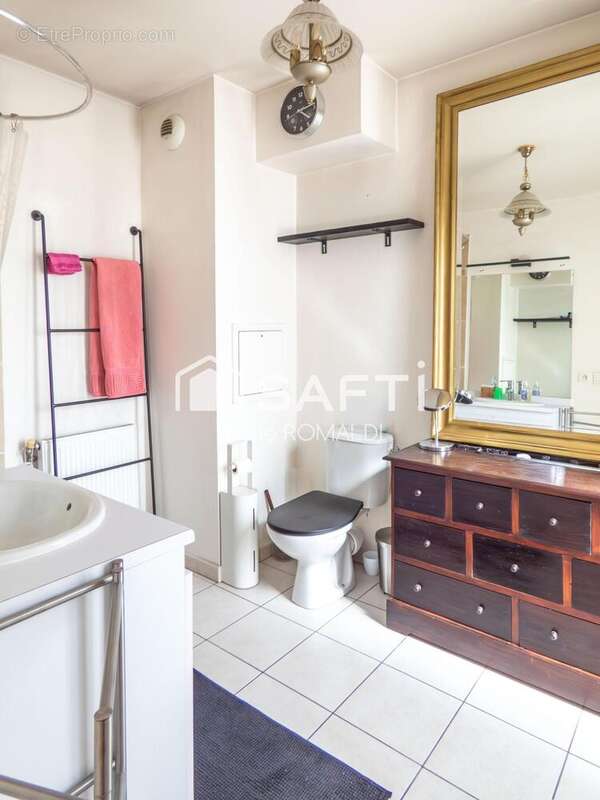 Photo 9 - Appartement à LA COURNEUVE