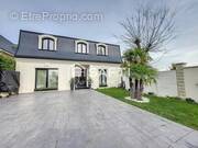 Photo 1 - Maison à LE PLESSIS-TREVISE