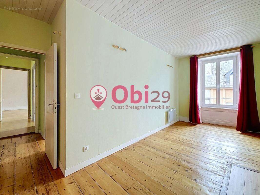 Appartement T4 de 100 m² – Centre-ville de Châteaulin - photo 5