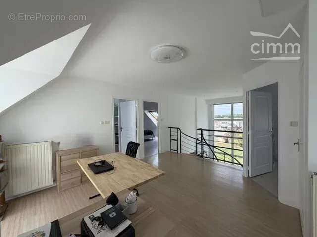 Maison 160 m² avec double garage de 100 m² - photo 14