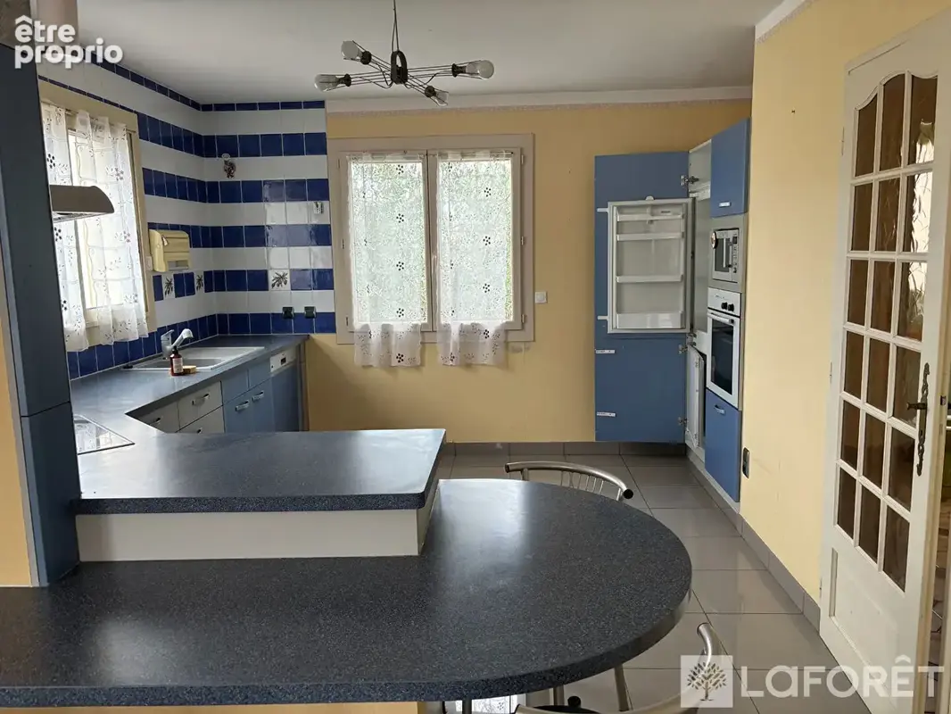 Maison 3 faces de 163 m² avec jardin et garage - photo 13