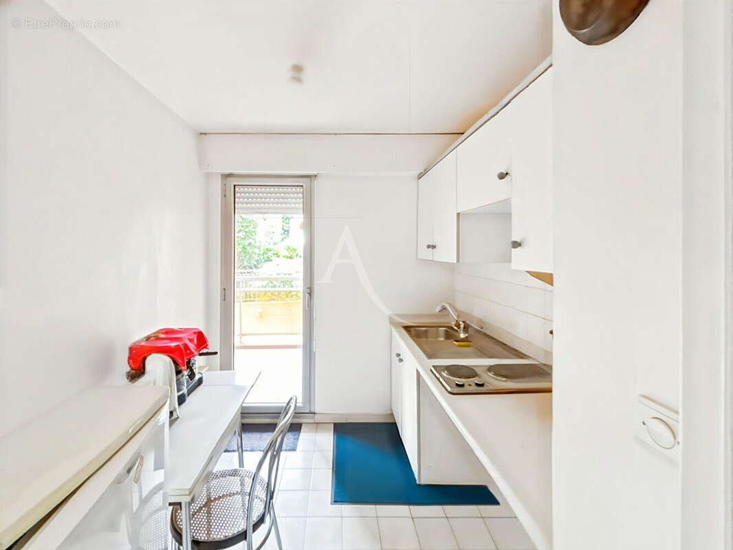 LE CANNET  Appartement  2 pièces 45m² avec terrasse, garage, cave et piscine - photo 7