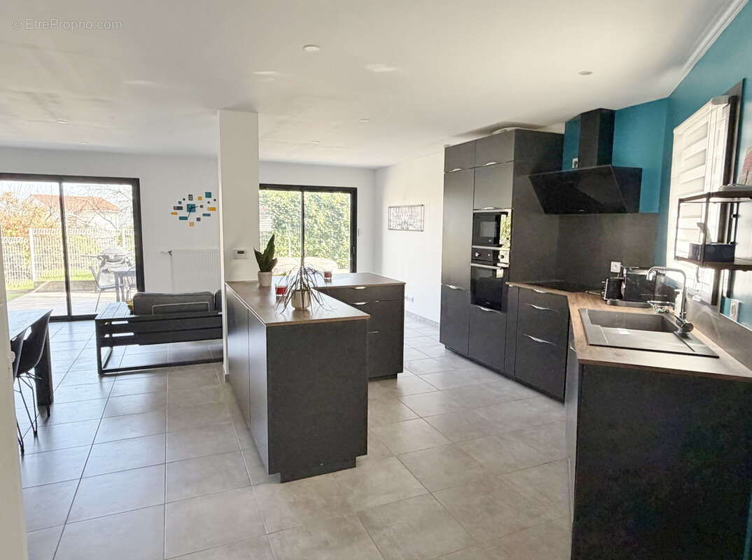 Maison à SAINT-GENIS-LES-OLLIERES