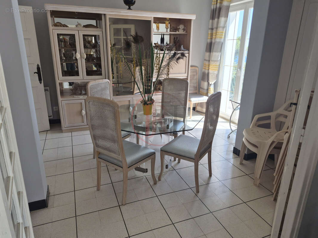 Appartement T4 en R+2 - photo 4