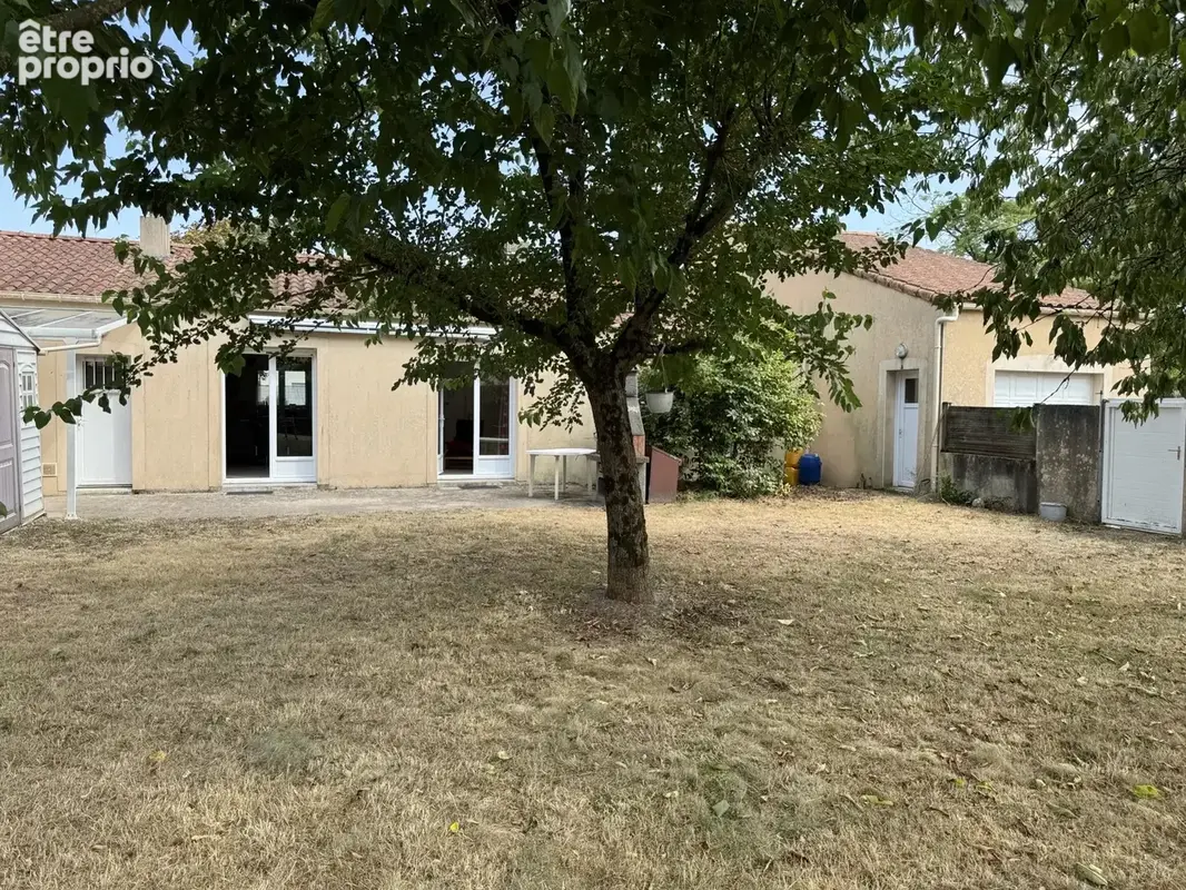 MONTBERT Plain pied idéalement placé 4 chambres sur belle parcelle - photo 4