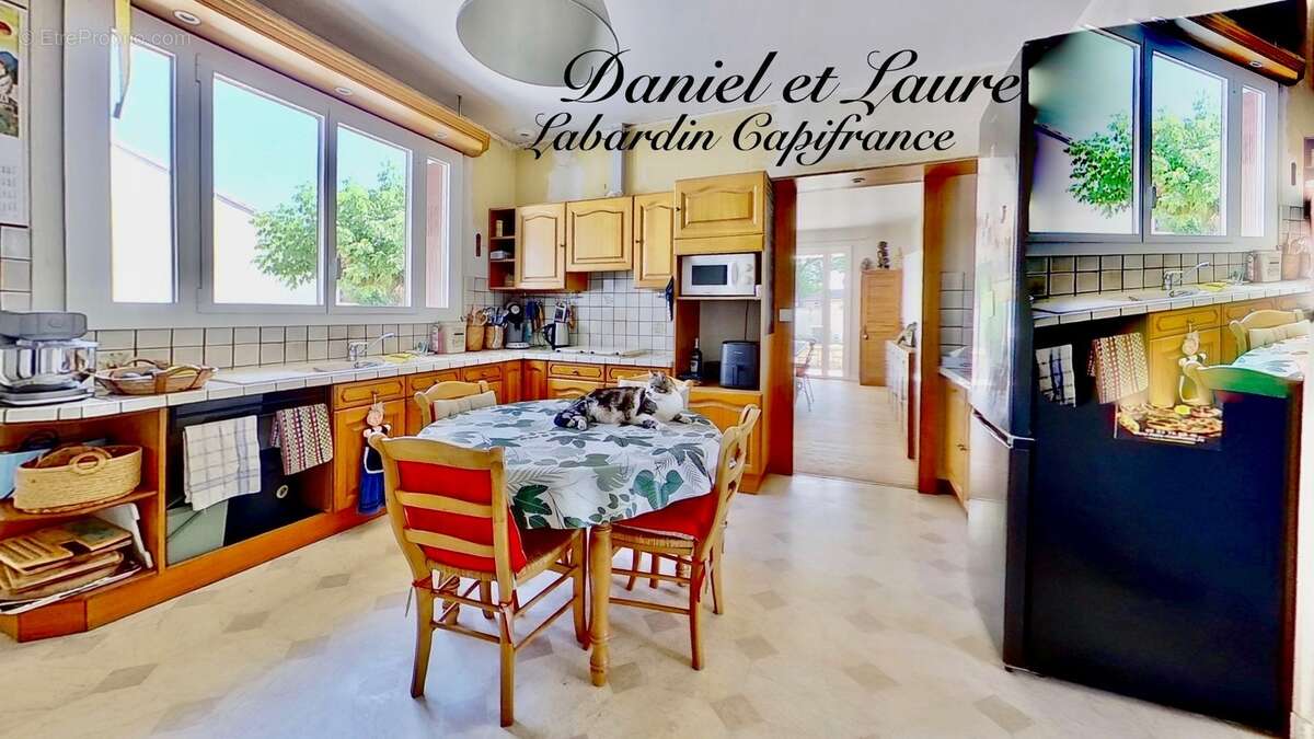 Maison de plain-pied - 4 chambres - garage - terrain clos - photo 2