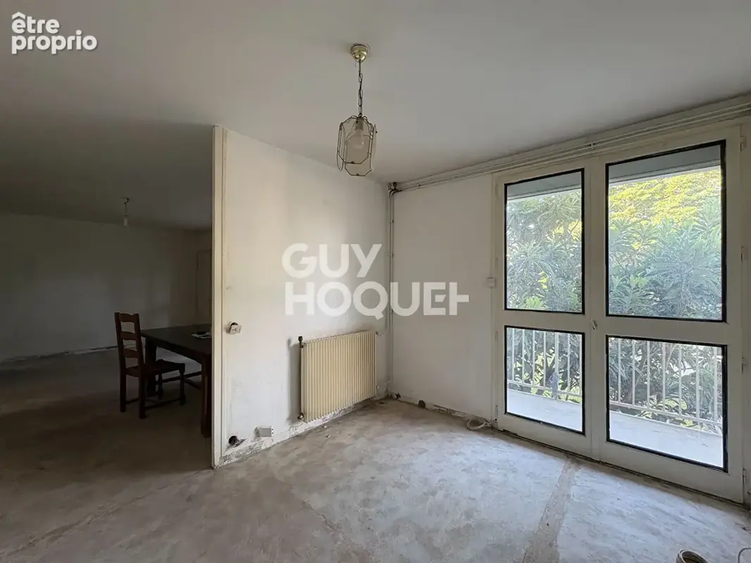 Spacieux T5 à rénover de 105,51 m² avec balcons et cave - photo 2