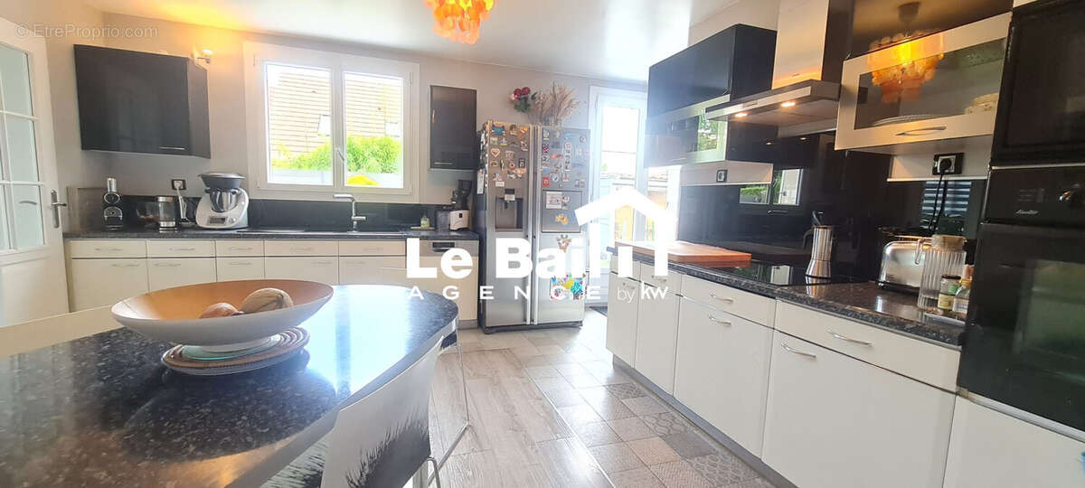 Maison 180 m² à Osny  - photo 9
