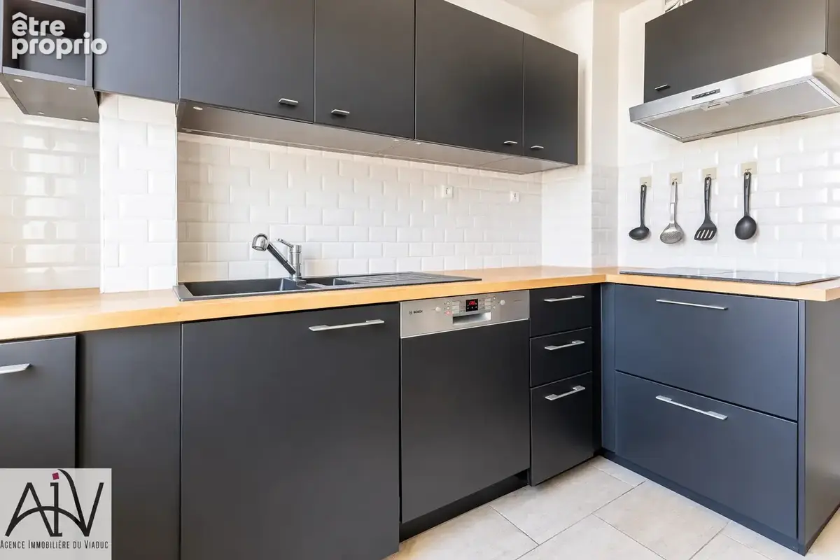 Appartement 5 pièces de 82 m2 avec trois chambres, box et cave - photo 6