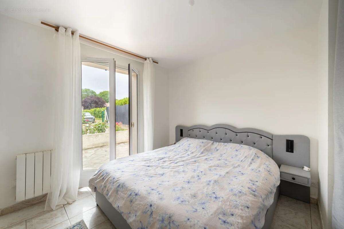 Maison de 6 pièces de 100 m² à Ézy-sur-Eure - photo 11