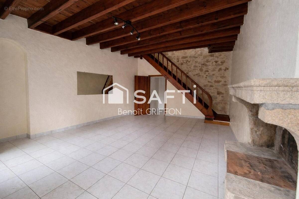 Photo 1 - Maison à LES LANDES-GENUSSON