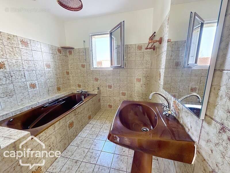 Maison sur sous-sol avec accès de plain-pied – Proche commodités - THOUARS (79) - photo 10