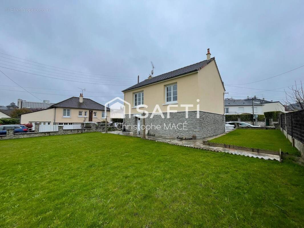 Photo 1 - Maison à LAVAL