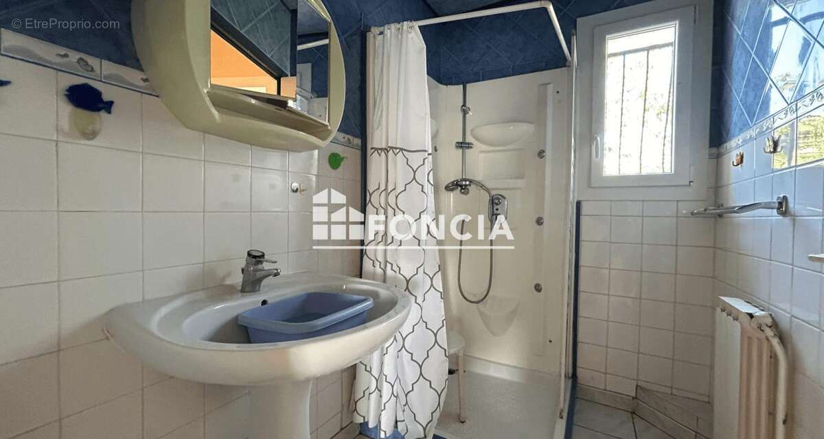 Charmante maison de 131 m² sur deux niveaux avec garage et véranda - photo 12