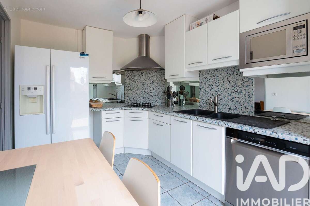 Photo 7 - Maison à SAINT-GENIS-LES-OLLIERES