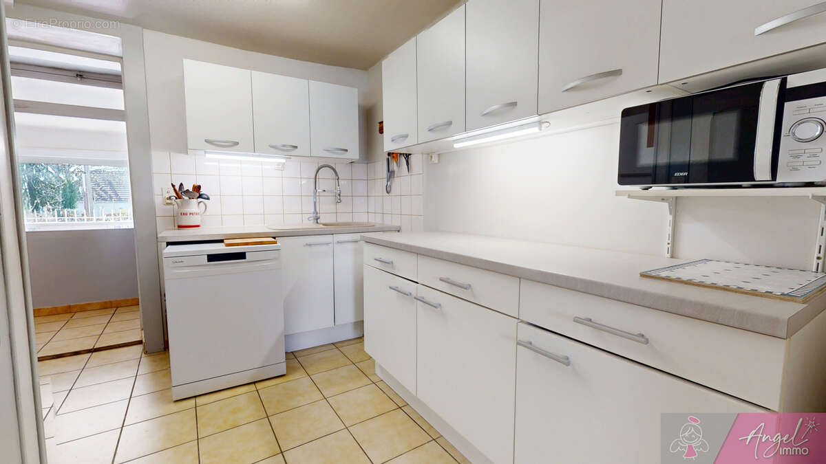 Immeuble de rapport a dole - 2 logements independants + garage + jardin - photo 9