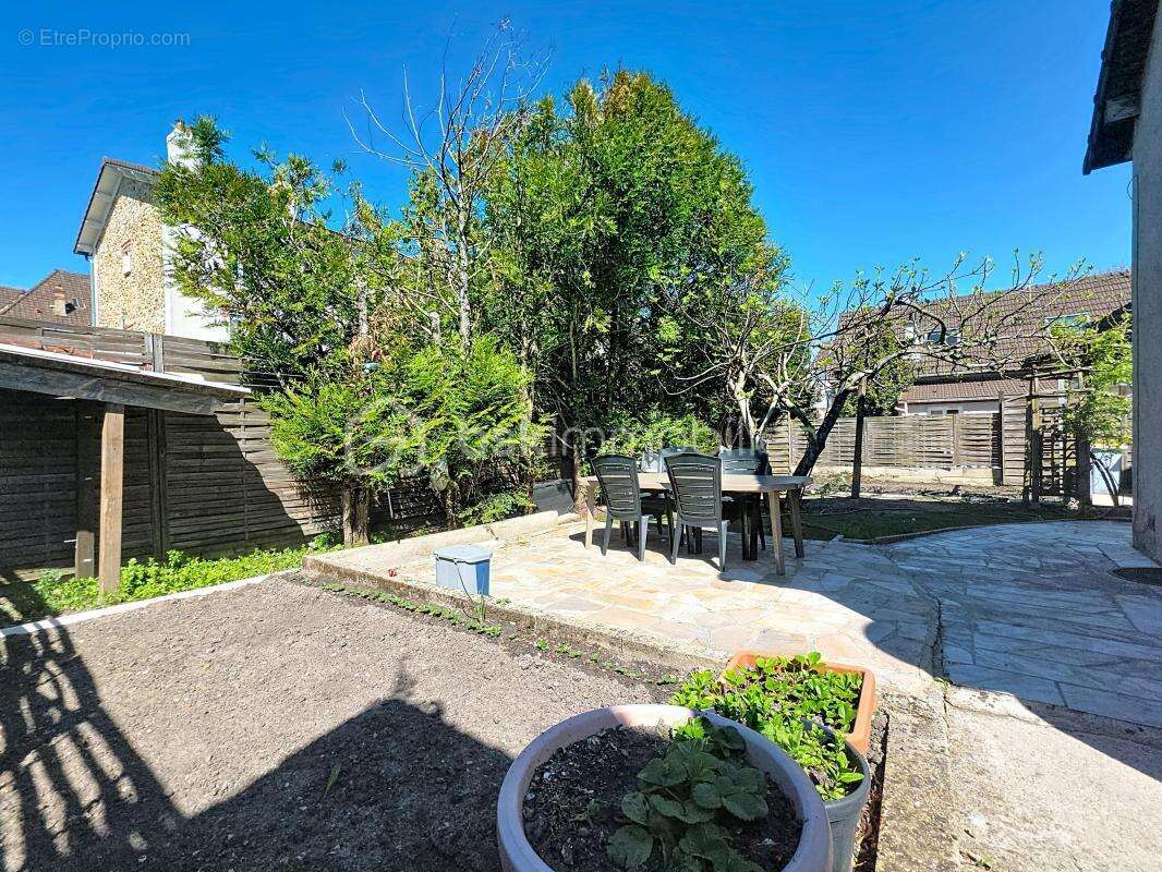 Maison familiale de 142 m² avec jardin - photo 18