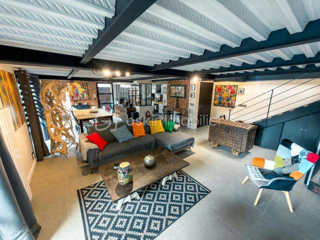 Loft d'exception de 126m2 - 3 Chambres - Charme industriel & volumes remarquables - photo 4