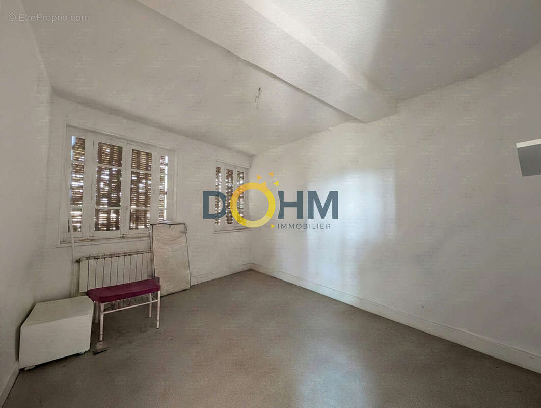 Ancien atelier de tissage a rehabiliter avec un appartement t4 sur un terrain de 497 m2 - photo 7
