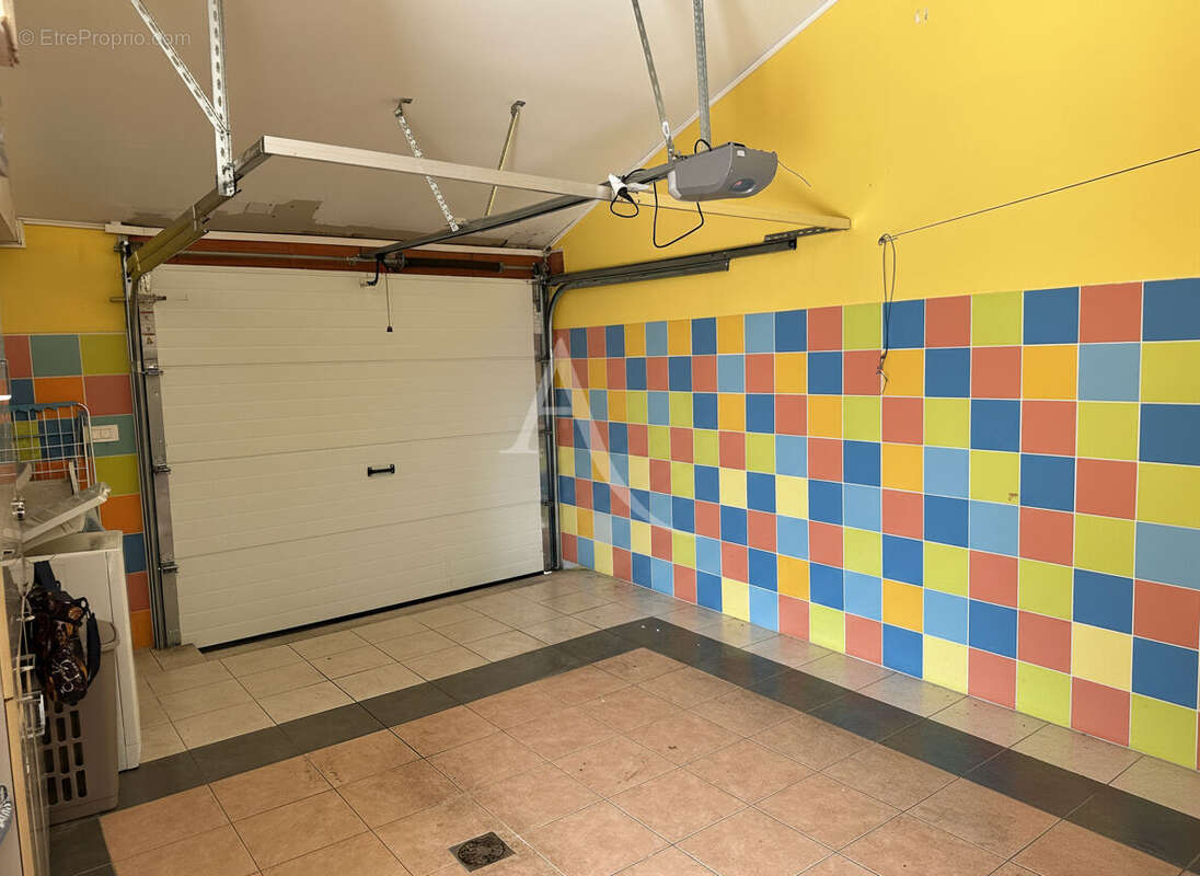 Maison de plain-pied avec garage , Confort et fonctionnalité - photo 11