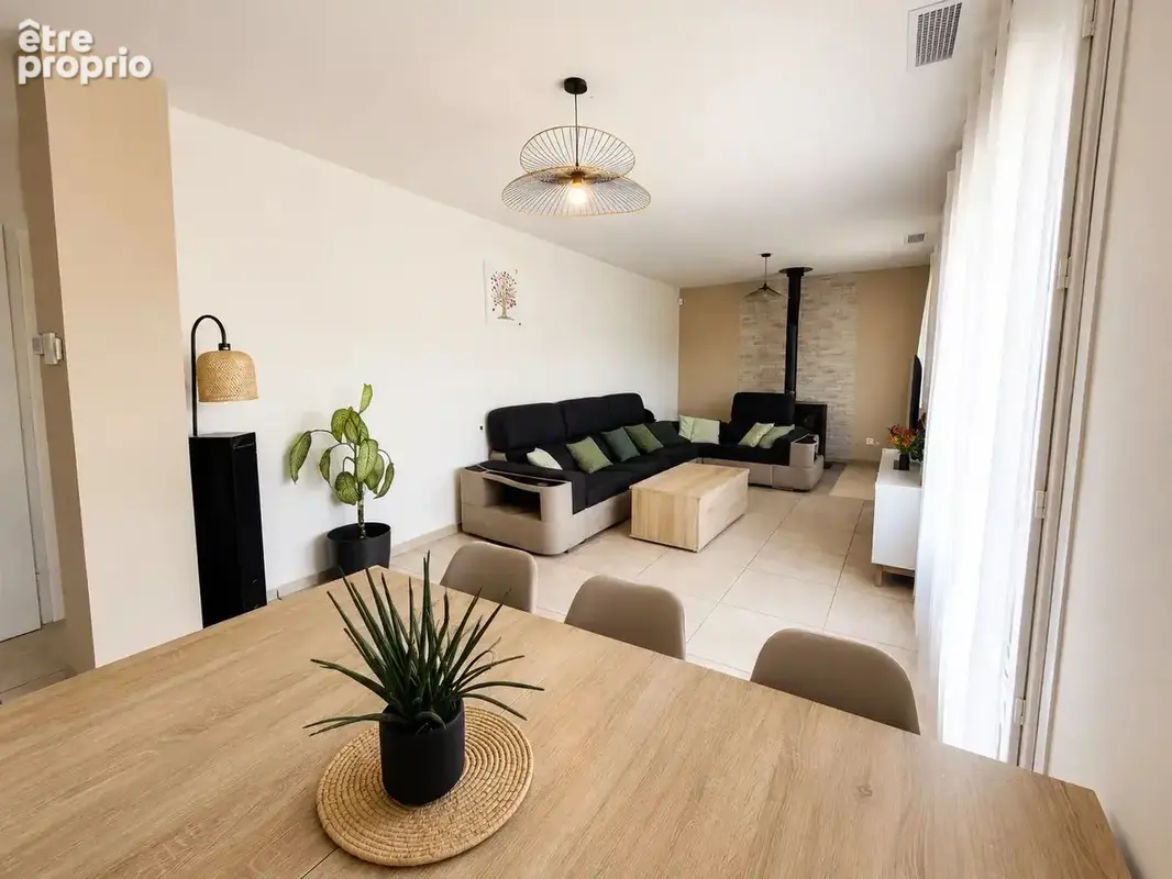 Maison de plain-pied de 115 m² avec garage et jardin - photo 2