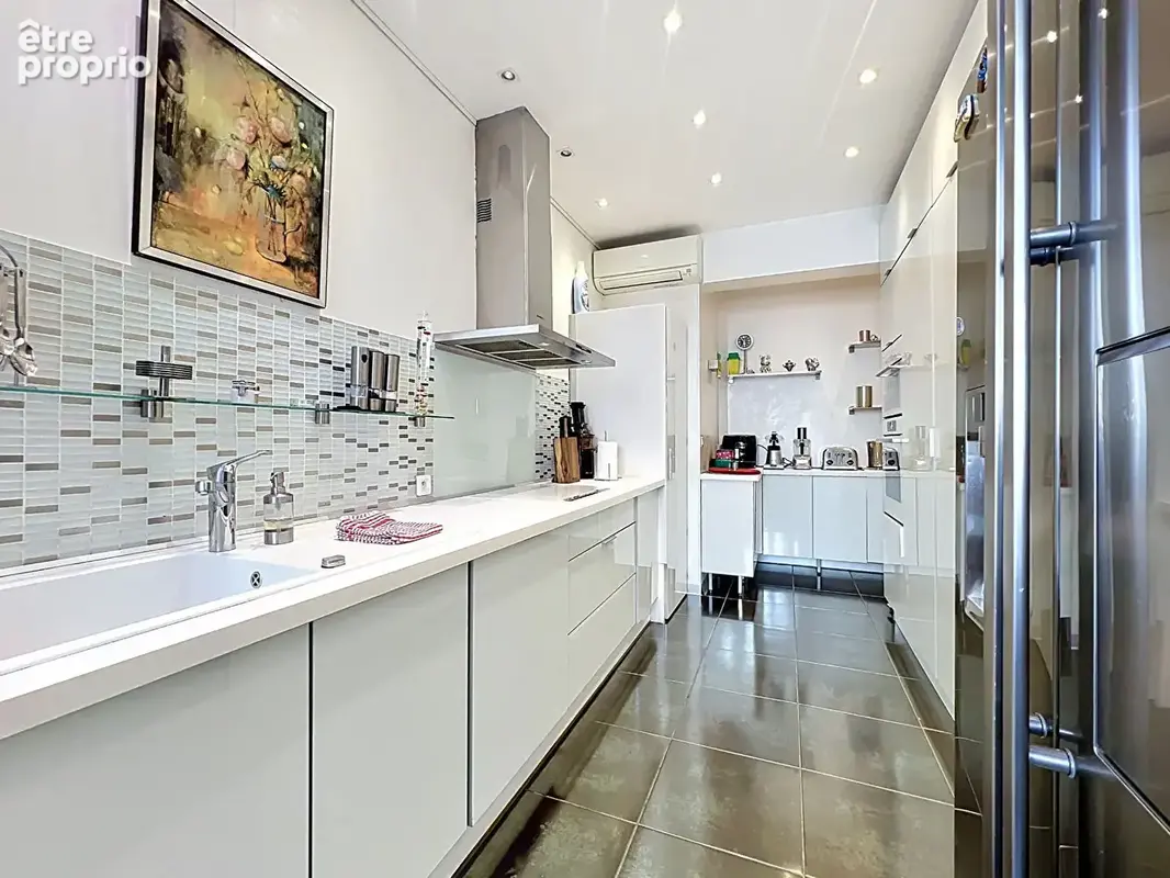 URGENT - Superbe appartement de standing aux beaux volumes - photo 8